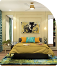 A bedroom with curtains, dressing table and bed