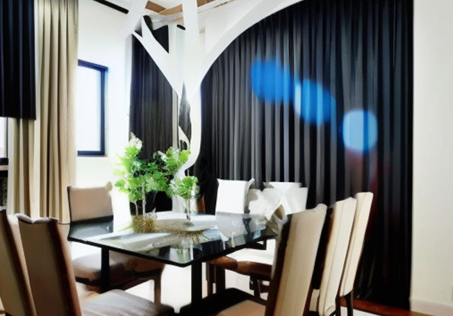 Curtain design as a partition wall between living & dining room - Asian Paints