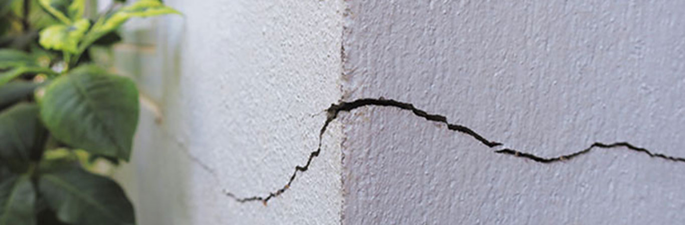 Cracked concrete building wall outside corner - Asian Paints
