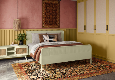 Green Bed with Pink Walls