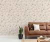 Pillows on brown leather settee in white living room interior with plant and copy space. Real photo Pillows on brown leather settee in white living room interior with plant and copy space. Real photo