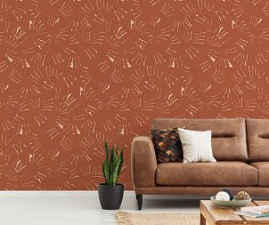 Pillows on brown leather settee in white living room interior with plant and copy space. Real photo