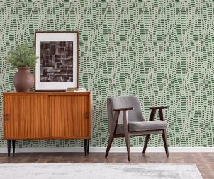 Vintage living room interior with retro furniture and poster on the cabinet, real photo with copy space on the white wall