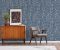 Vintage living room interior with retro furniture and poster on the cabinet, real photo with copy space on the white wall