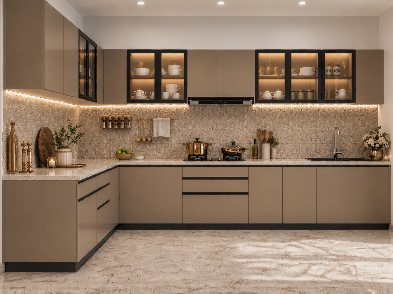 Sophisticated L-Shaped Kitchen with Warm Display Lighting Luxury kitchen with taupe handleless cabinets, illuminated glass-front wall units, white marble-look countertops, and patterned tile backsplash - Beautiful Homes
