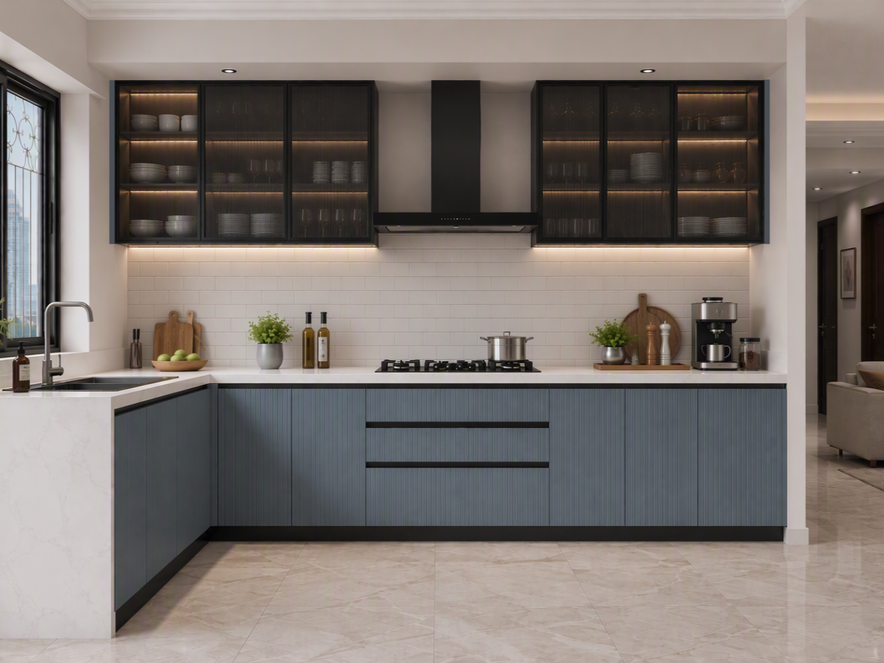Refined Blue Kitchen with Warm Lit Glass Storage Contemporary kitchen with dusty blue fluted lower cabinets, black-framed ribbed glass wall units, and white marble-look waterfall countertop - Beautiful Homes