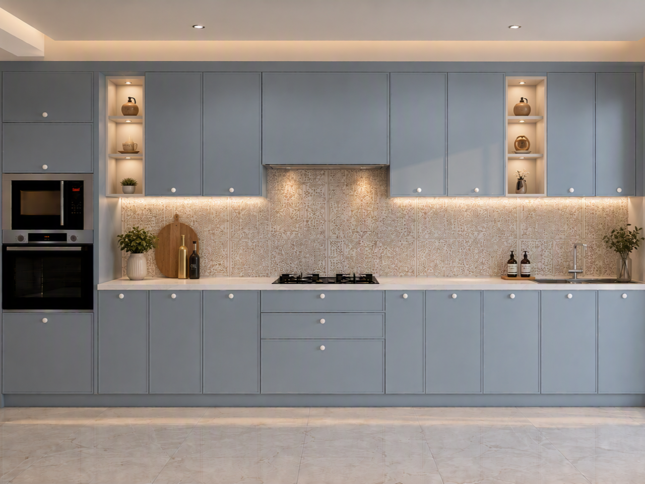 Dusty Blue Modular Kitchen with Patterned Tile Backsplash and Display Niches Modern straight dusty blue modular kitchen featuring illuminated open display niches and a patterned tile backsplash - Beautiful Homes
