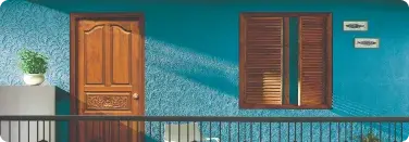 Teal blue exterior wall in Apex Createx texture with a wooden door and window