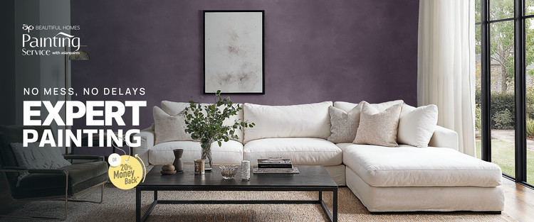 Expert painting with no mess and no delays - lavender living room with a white sofa